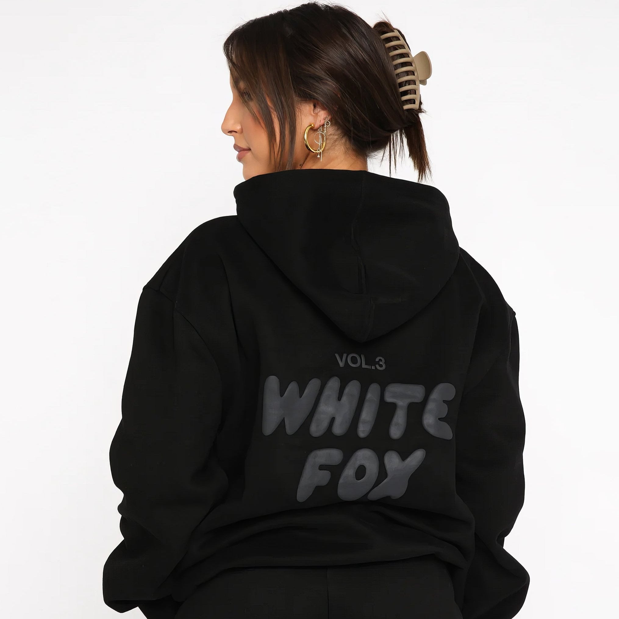 A sleek and modern Whitefox Autumn Kit, featuring a stylish, tailored tracksuit in classic white. The kit is crafted from premium, breathable fabric (65% cotton, 35% polyester), designed for maximum comfort during both active days and relaxed weekends. It includes thoughtful details like a bold logo, snug cuffs, zippered pockets, and an adjustable waistband for a perfect fit. The versatile design easily transitions from casual to sporty, making it a wardrobe staple for all body types.