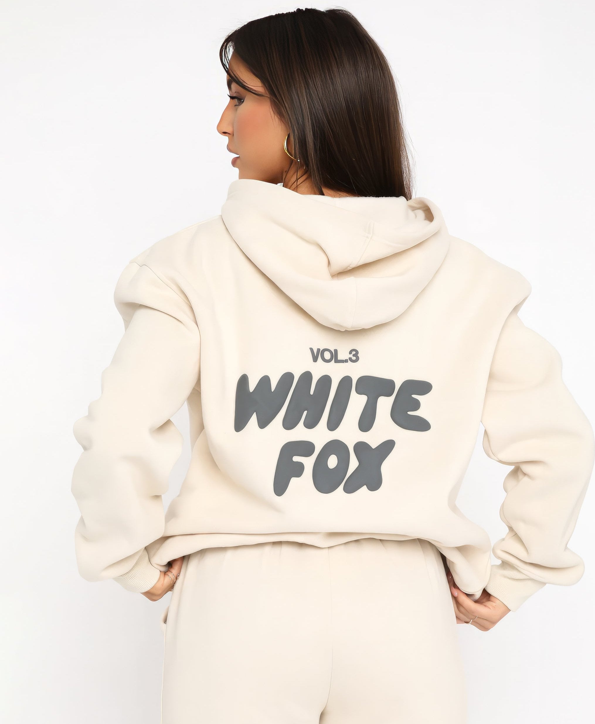 A sleek and modern Whitefox Autumn Kit, featuring a stylish, tailored tracksuit in classic white. The kit is crafted from premium, breathable fabric (65% cotton, 35% polyester), designed for maximum comfort during both active days and relaxed weekends. It includes thoughtful details like a bold logo, snug cuffs, zippered pockets, and an adjustable waistband for a perfect fit. The versatile design easily transitions from casual to sporty, making it a wardrobe staple for all body types.